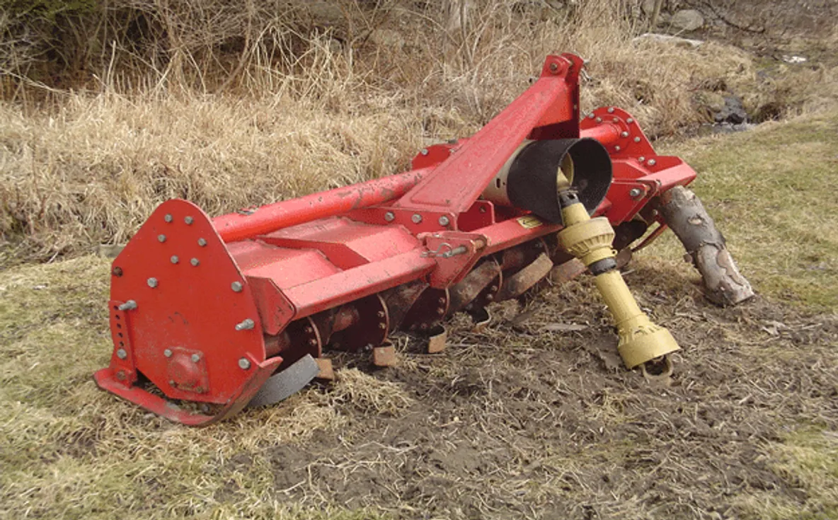 Rototiller attachment in field